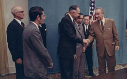 Glenn Seaborg shaking hands with Lyndon B. Johnson