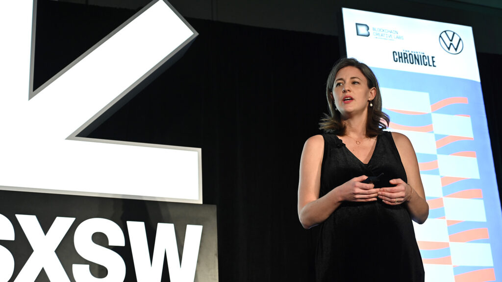 Color photo of a woman on stage