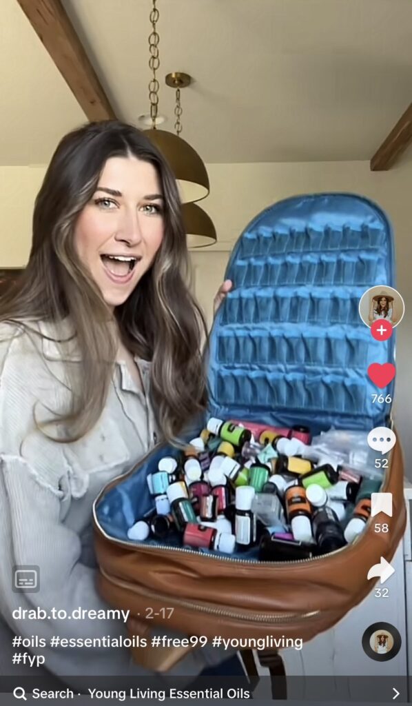 Screenshoot with woman holding padded backpack full of small glass containers