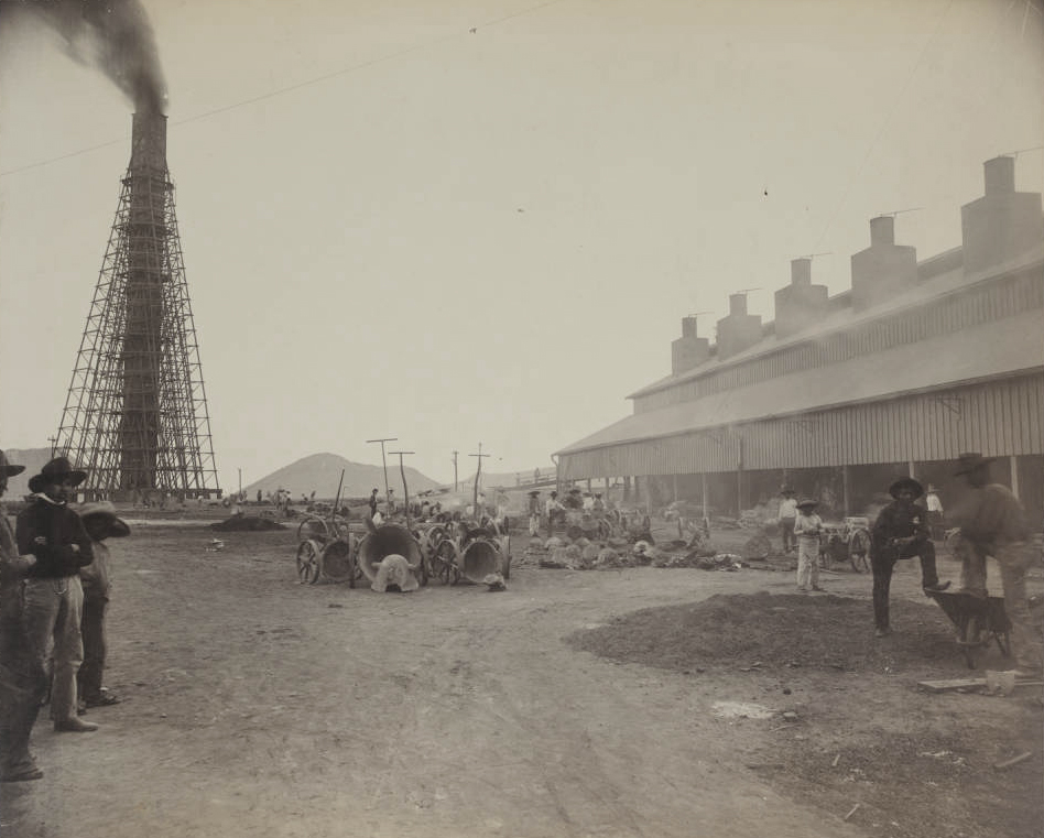 Old photo of a dusty mining scene