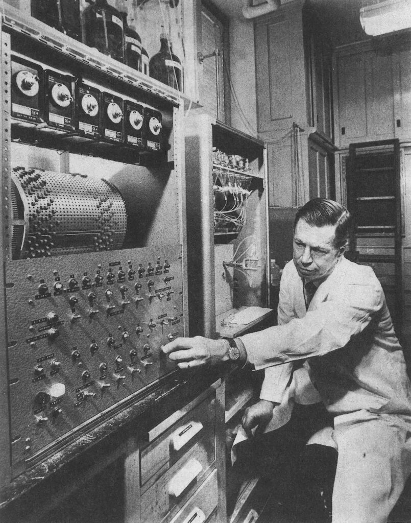 Man working with scientific instrument