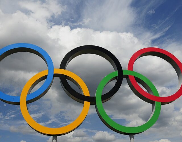 Photo of the Olympic rings with the sky in the background