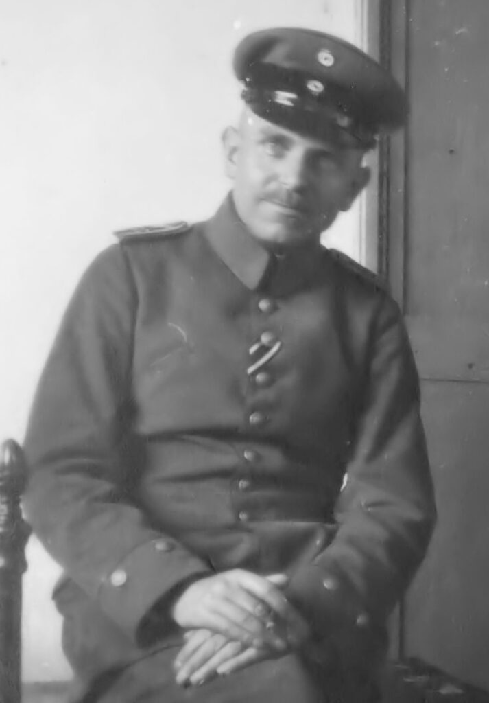 Black and white photo portrait of man in uniform