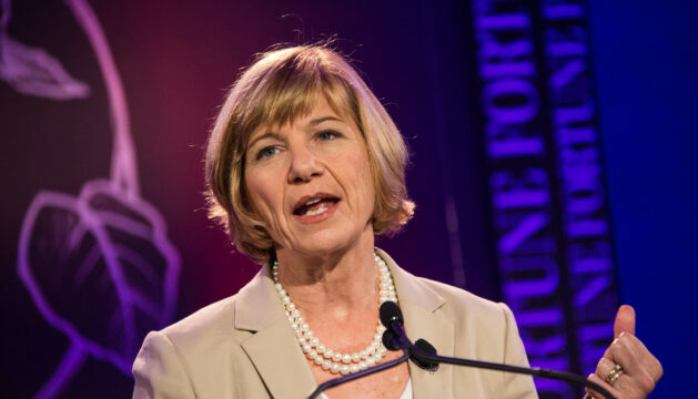 Photograph of Sue Desmond-Hellman speaking on stage.