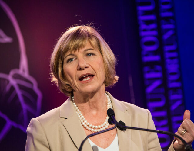 Photograph of Sue Desmond-Hellman speaking on stage.