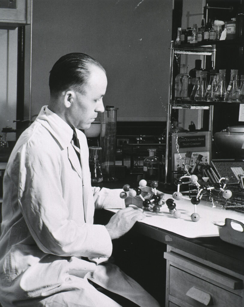 man working at chemistry lab bench