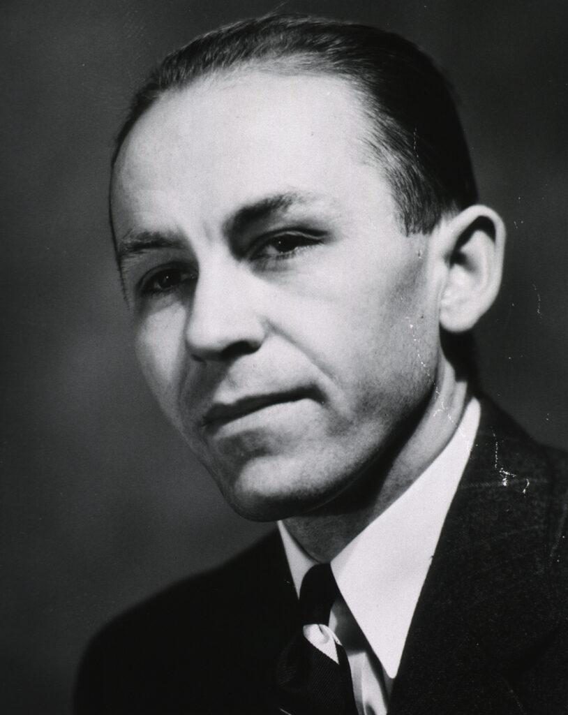 Black and white photo of man in suit