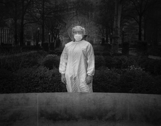 Black and white photograph of nurse Sara Cohen in full PPE.